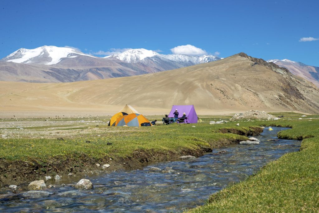 Campsite beside a brook at Gyamalhoma