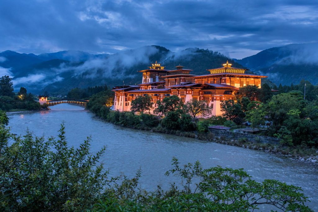 Zen Bhutan: yoga and meditation in a peaceful setting with views of lush valleys and colorful monasteries.