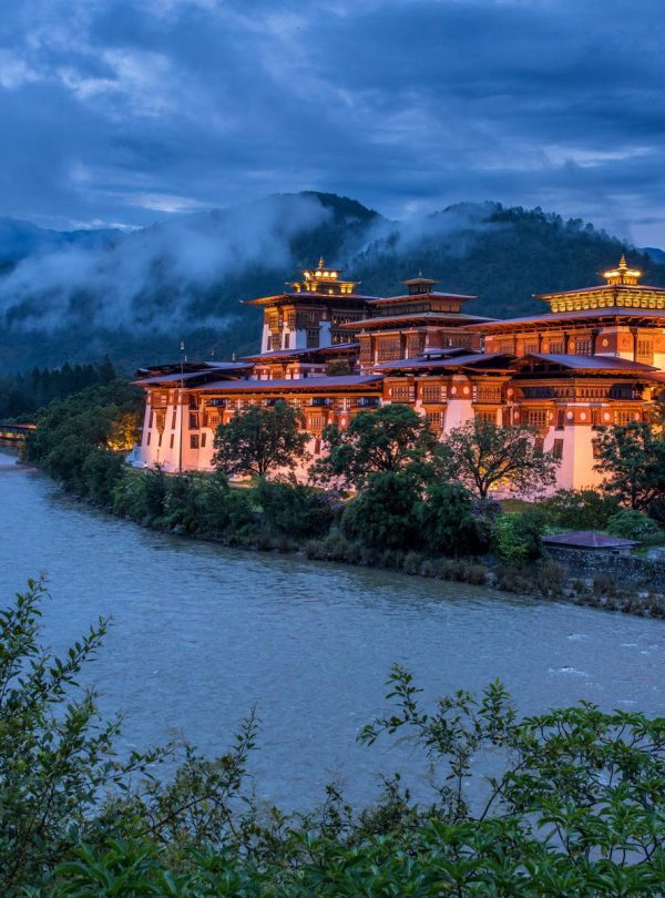 Zen Bhutan: yoga and meditation in a peaceful setting with views of lush valleys and colorful monasteries.