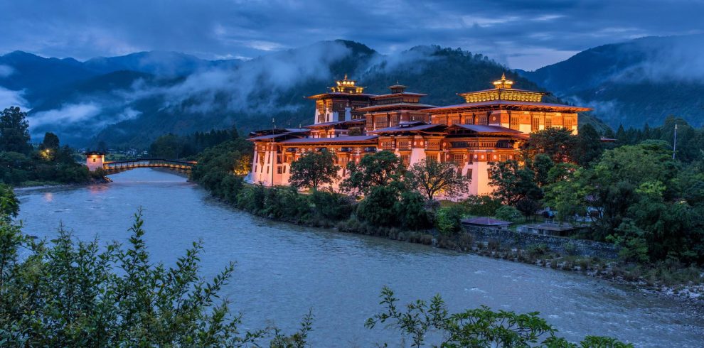 Zen Bhutan: yoga and meditation in a peaceful setting with views of lush valleys and colorful monasteries.